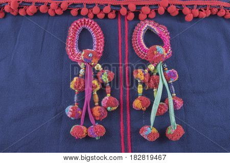 Colorful Tassel And Hmong hilltribe Handmade with selective and soft focus.
