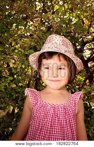 Portrait of beautiful asian girl with hat