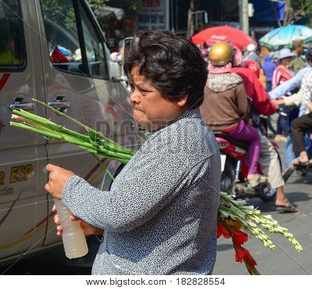 Vendor On Street In Saigon, Vietnam
