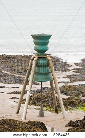 Tidal bell at Cemaes Bay in Anglesey North Wales
