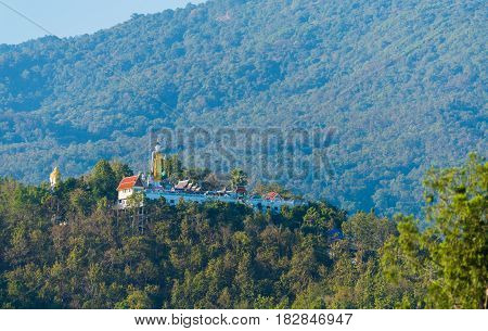 Holy Buddha Statue On Mountain .