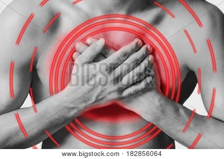 Man is clutching his chest acute pain possible heart attack. Monochrome image isolated on a white background. Pain area of red color.