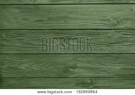Green painted wood board texture and background. Green natural wooden background. Wood planks pattern. Wooden surface. Horizontal timber texture. Green color wood barn.  Wood board background. Green wooden barn background.