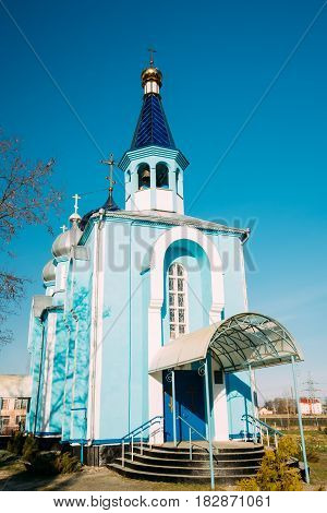 Village Krasnoe, Gomel Region, Belarus. Old Orthodox Church Of The Assumption At Sunny Spring Day. Famous Landmark.