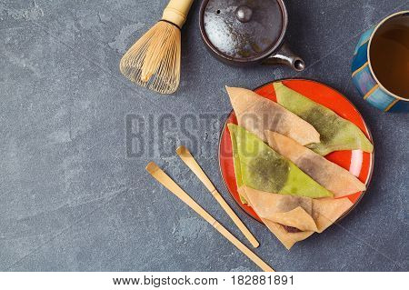 Japanese food traditional kyoto sweet dessert and green tea on dark background. View from above