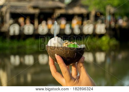 Ice cream in coconut shell
 Klong Dan floating market Ranot District, Songkhla Province, Thailand