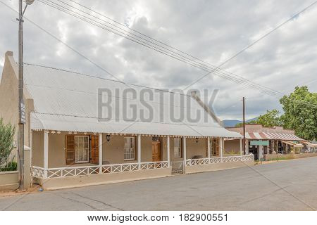 CALITZDORP SOUTH AFRICA - MARCH 24 2017: An historic old building in Calitzdorp which served as home shop and postal agency through the years. Built pre 1860