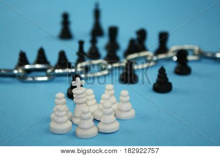 Fear from refugees concept. Chess pieces symbolize migration borders christianity and islam cultures immigration crisis.