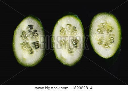 The Core Of The Cucumber On Black