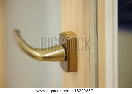 Detail of window handle on wooden window