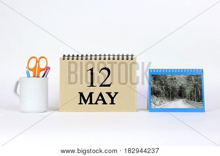 Deadline 12 May Calendar With White Background and Office.