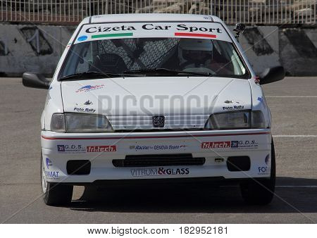 Chiavari Italy - April 22 2017 - 2nd T.A.M. (Tigullio Auto and Motorcycle) National Motor Show: Rally car show (here a Peugeot 106) in the circuit circuit of the fair.