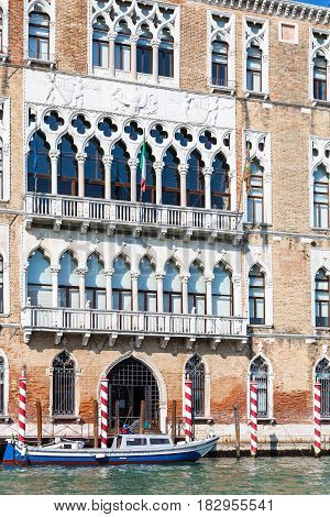 Boat And Palazzo On Grand Canal In Venice