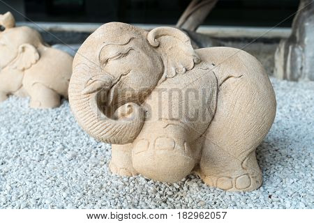 Stone brown elephant figurine decorative in garden