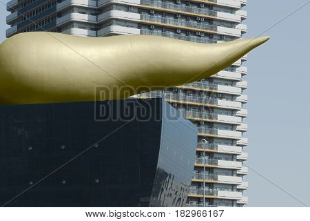 Modern Architecture in Tokyo. Asahi Beer Hall with its distinctive gold Flamme d'Or icon. April 14, 2014 - Asakusa, Tokyo
