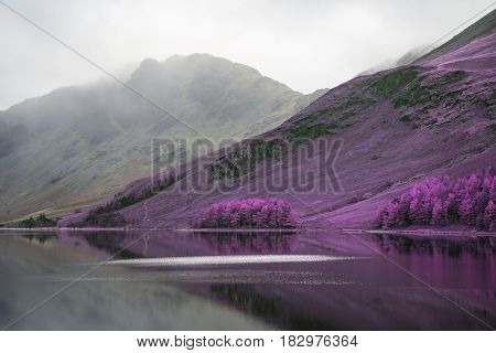 Stuning Aternate Color Autumn Fall Landscape Image Of Lake Buttermere In Lake District England