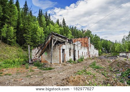 ruins of an abandoned building on the Bank of the Usva river. Russia The Urals