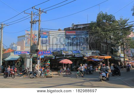 HO CHI MINH CITY VIETNAM - NOVEMBER 26, 2016: Unidentified people visit Dan Sinh market. Dan Sinh market is known for the place to buy army and war souvenirs and memorabilia.