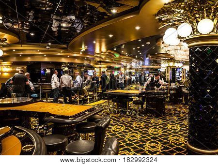 CRUISE LINER SPLENDIDA - APRIL 4, 2017: People in gambling casino of Cruise liner Splendida