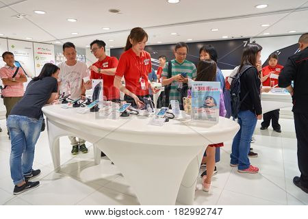 HONG KONG - CIRCA NOVEMBER, 2016: people at SmarTone shop. SmarTone Telecommunications Holdings Limited is a wireless communications carrier with operating subsidiaries in Hong Kong and Macau.