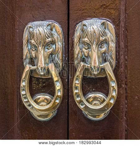 door with horse decoration in Spain, Cadiz