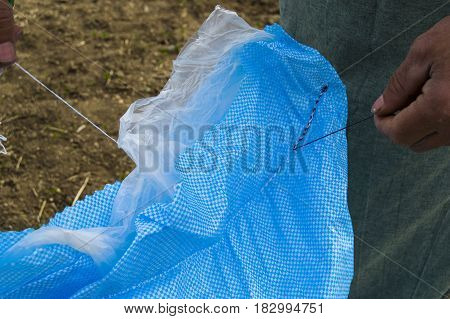 Farmers who fertilize the field with primitive methods, fertilized field pictures, agricultural fertilizer