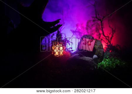 Night Wedding Ceremony With A Lot Of Vintage Lamps And Candles On Big Tree