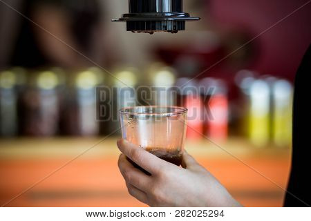Making Coffee And French Press Coffee Maker