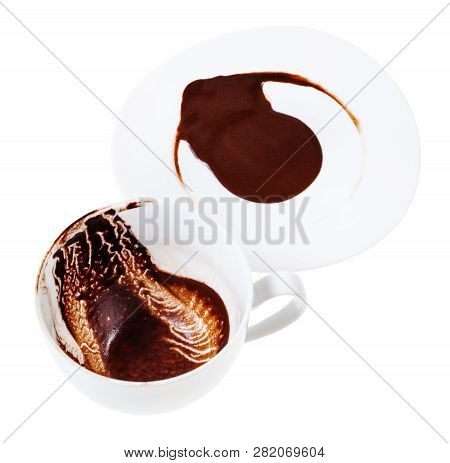 Divination On Carob Drink Sediments - White Porcelain Cup And Saucer With Carob Grounds Isolated On 