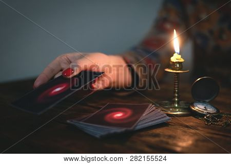 Tarot Cards And A Woman Fortune Teller. Future Reading Concept. Divination.