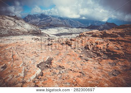 Postglacial Landscape With Crushed Stones In Swiss Alps