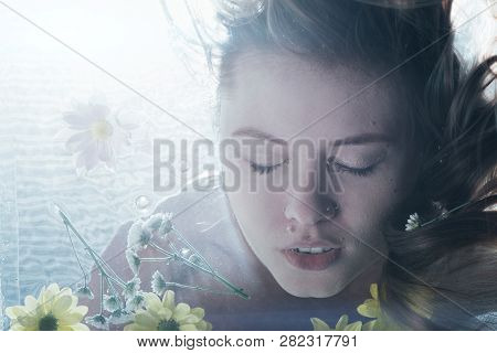 Close Up Of Beautiful Woman Posing Underwater With Closed Eyes