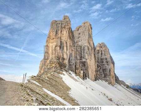 Spring On Trail Around Tre Cime (three Peaks) Di Lavaredo Massive. The Famous Mountains In Dolomites