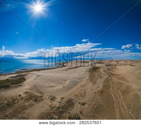 Mongol Els sand dunes  and lake Durgen Nuur.