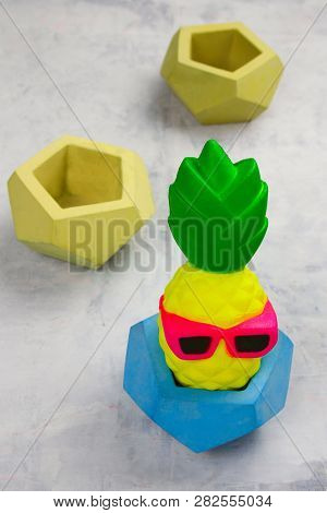 Funny Pineapple Toy In A Concrete Pot
