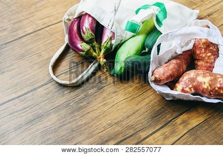 Zero Waste Use Less Plastic Concept / Fresh Vegetables Organic In Eco Cotton Fabric Bags On Wooden T