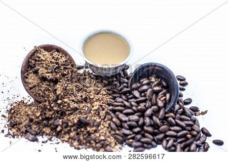 Close Up Of Paste Of Custard Apple Seeds In A Glass Bowl With Some Powdered Seeds And Raw Dried Seed