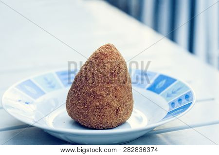 Sicilian Snack, Fried Ball Of Rice Arancino On A Plate, Tipical Street Food Of Sicily