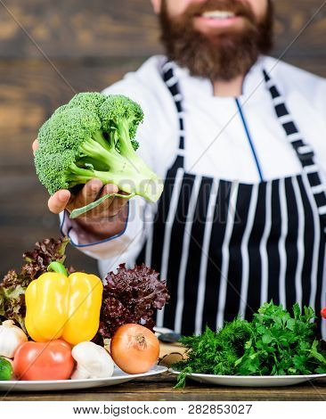Man Cooking Fresh Vegetables. Culinary Recipe Concept. Chef Use Fresh Organic Vegetables For Dish. F