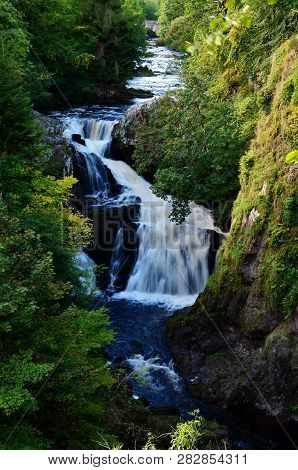 A View Of The Cascades Of The Reekie Linn Waterfalls In Glenisla, Perthshire