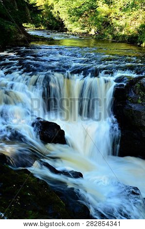 A View Of The Cascades Of The Reekie Linn Waterfalls In Glenisla, Perthshire