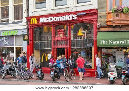 Amsterdam, Netherlands - June 25, 2017: View Of The Mcdonald Restaurant On The Muntplein Street In H