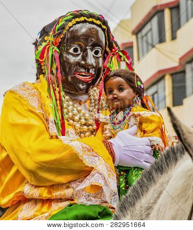 Latacunga, Ecuador - September 22, 2018 - Man Wears Mask Of Mama Negra During Annual Parade