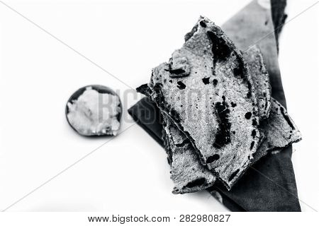 Close Up Of Common Or Main Ingredients Of Malida Isolated On White Which Are Rot Or Bajri Ki Roti Wi