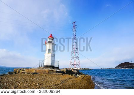 Lighthouse Tokarevskiy Egersheld On Tokarevskaya Koshka Cape In Vladivostok, Primorsky Krai In Russi