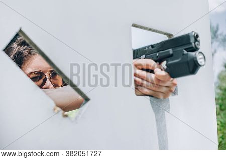 Close-up Abstract View Of Attractive Female Army Soldier With Gun