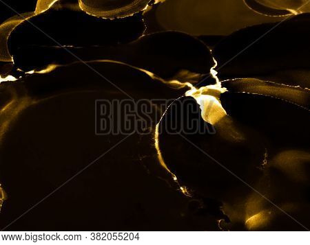 Premium Alcohol Ink Background. Japanese Ink Style. Golden, Black Marble Slab Design. Bright Gold Ce
