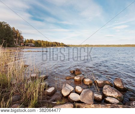 Huge Stones On The River Bank. Vuoksa River Near Imatra In The Leningrad Region, Russia. Coastline W