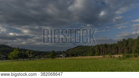 Color Evening With Cloudy Blue Sky In Ledenitzen Village In South Austria