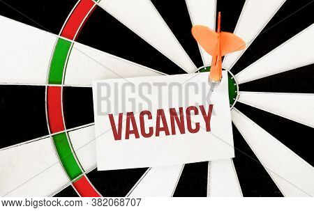 Handwriting Vacancy On Notepaper With Dart Arrow And Dart Board.